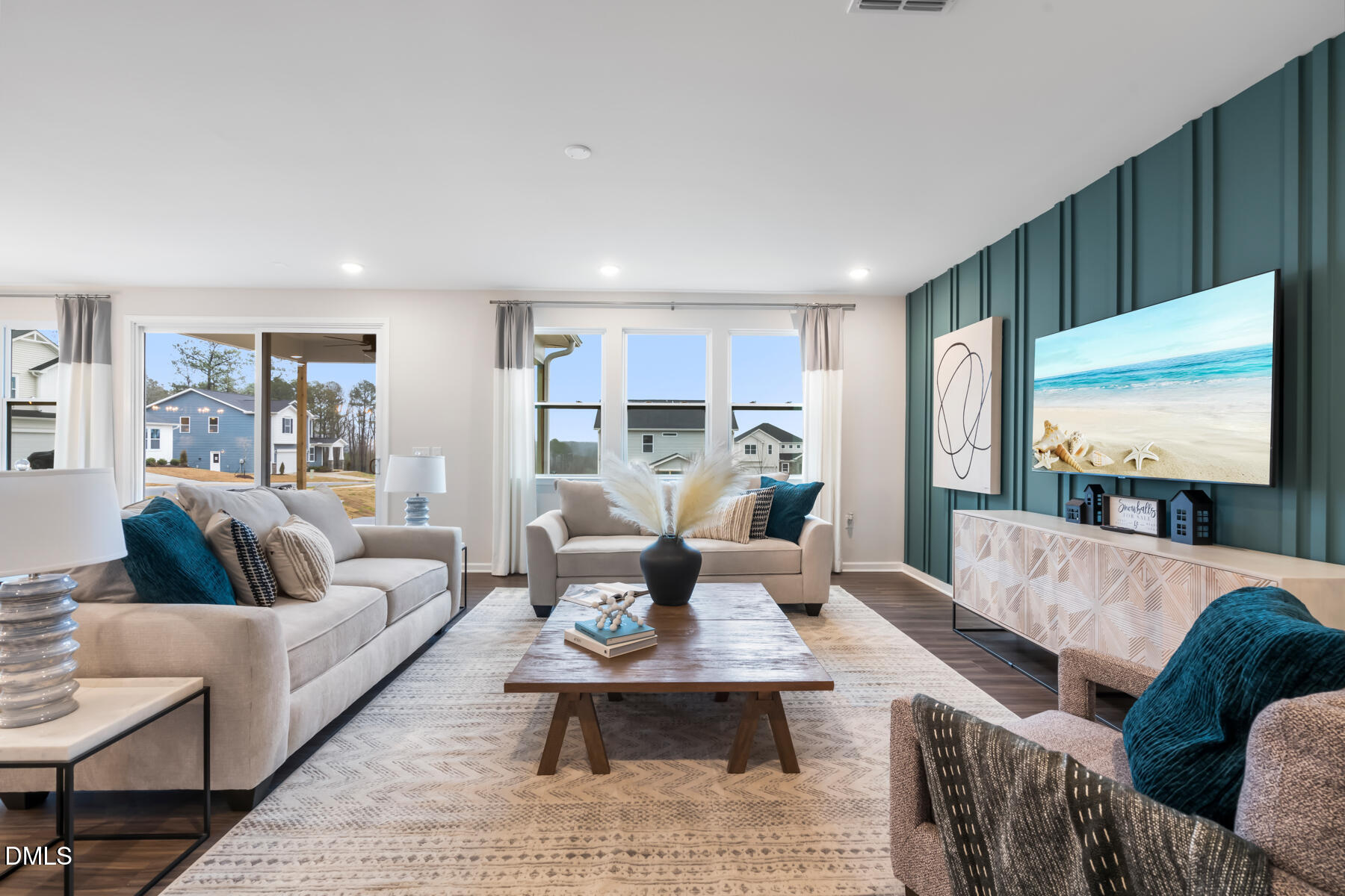 385 Denali Drive Angier, NC 27501 - Photo 15 of 19 a living room with furniture and a flat screen tv