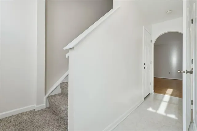 a view of entryway with wooden floor