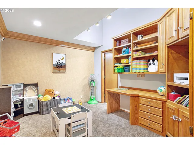 a bedroom with furniture and a window