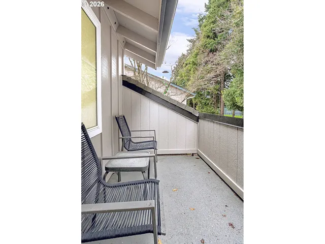 a view of staircase with furniture and stairs