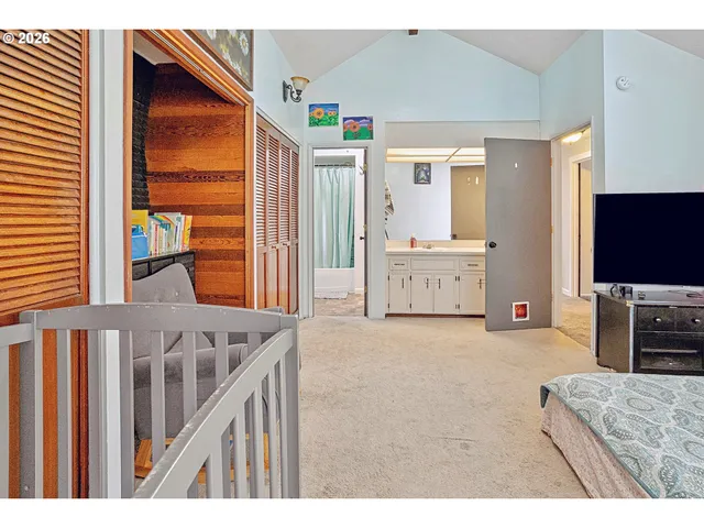 a view of living room with furniture and flat screen tv