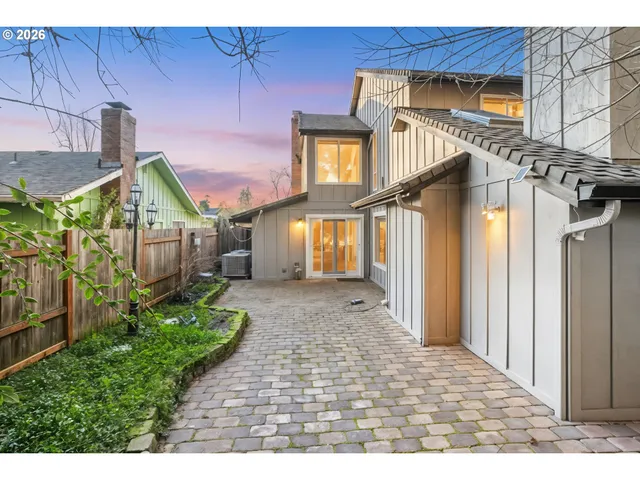 a view of a house with a wooden stairs