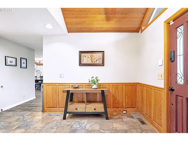 a utility room with table and window
