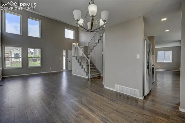 a view of a livingroom with wooden floor