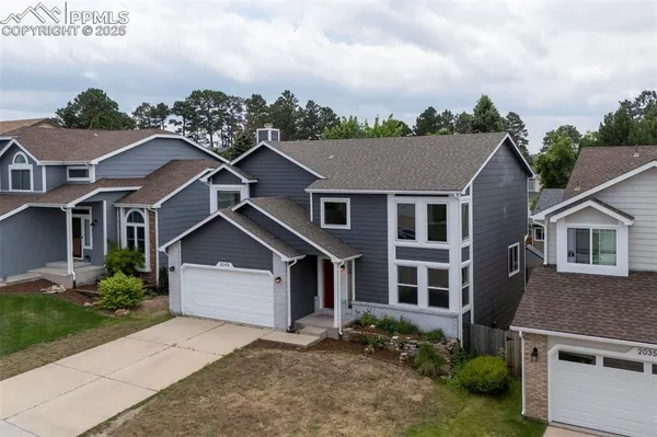 an aerial view of multiple house