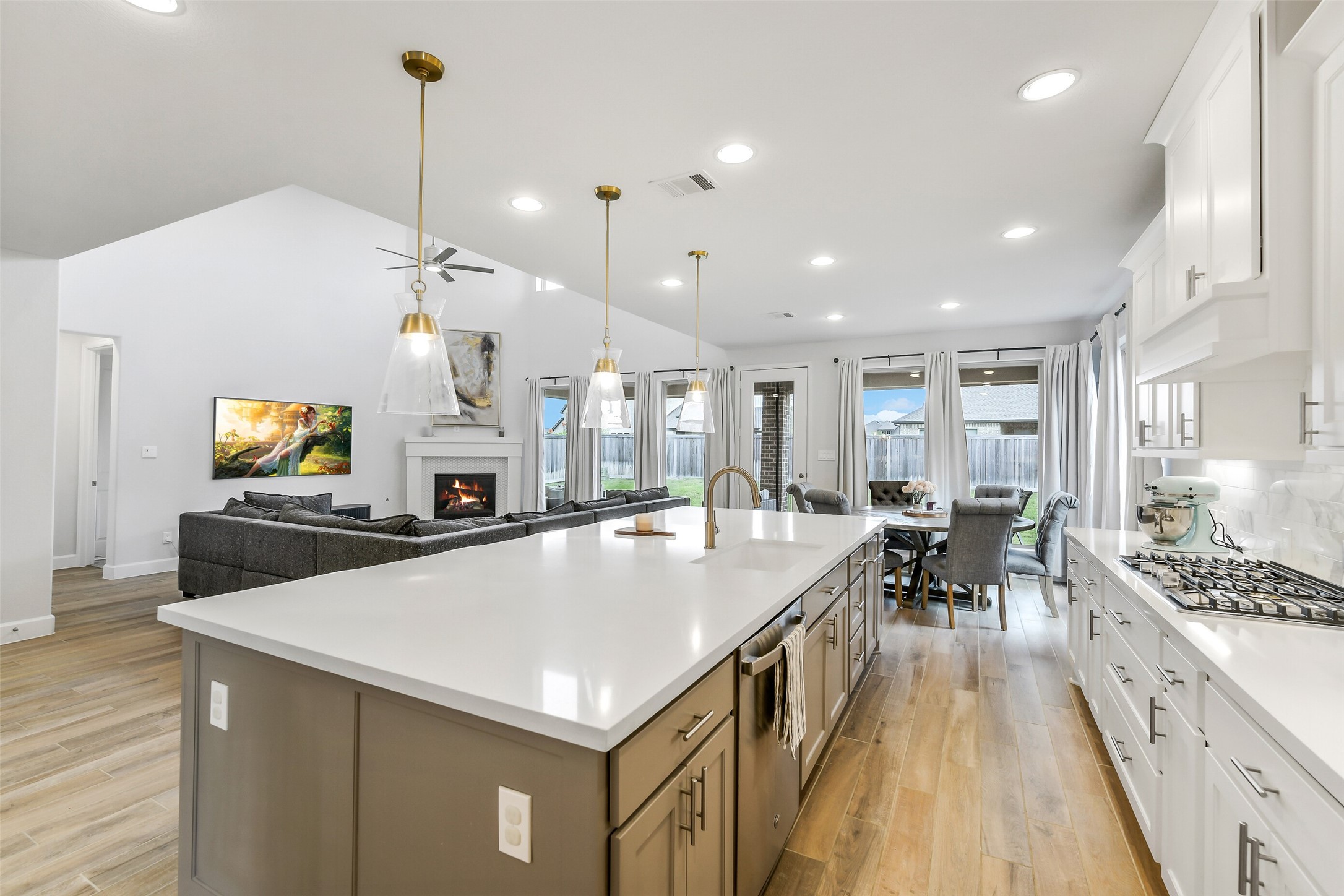 21222 Rabbitbrush Court Cypress, TX 77433 - Photo 11 of 36 a large kitchen with kitchen island a large island in it