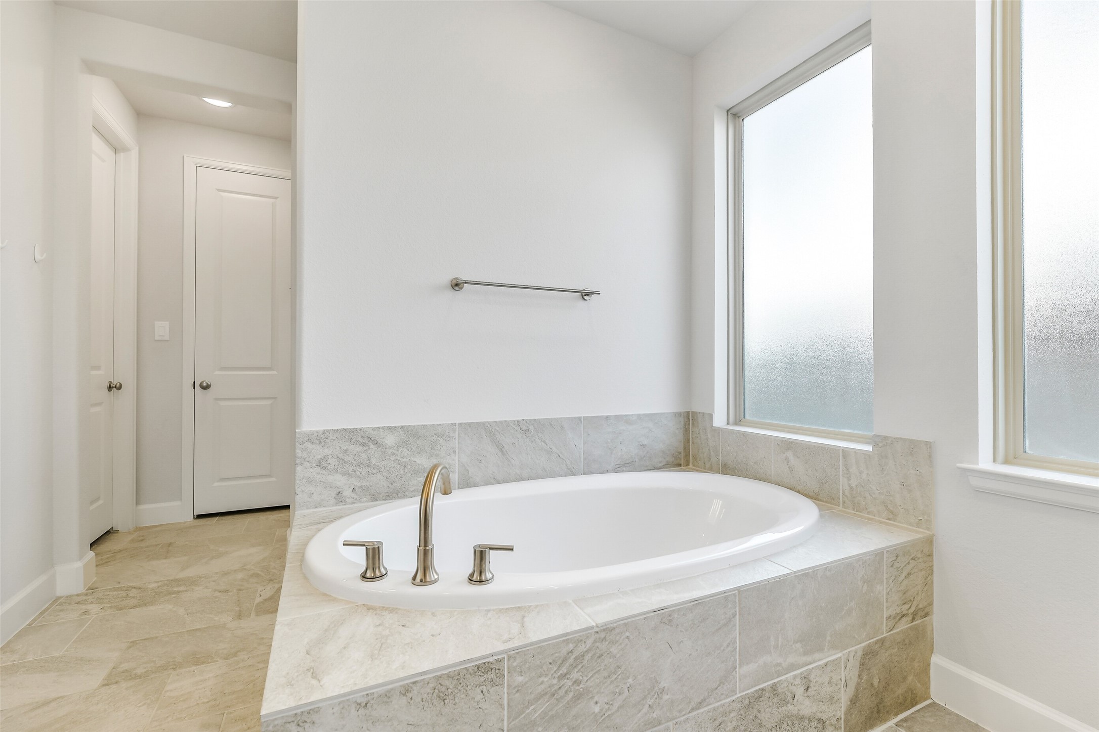 21222 Rabbitbrush Court Cypress, TX 77433 - Photo 22 of 36 a bathroom with bathtub and shower