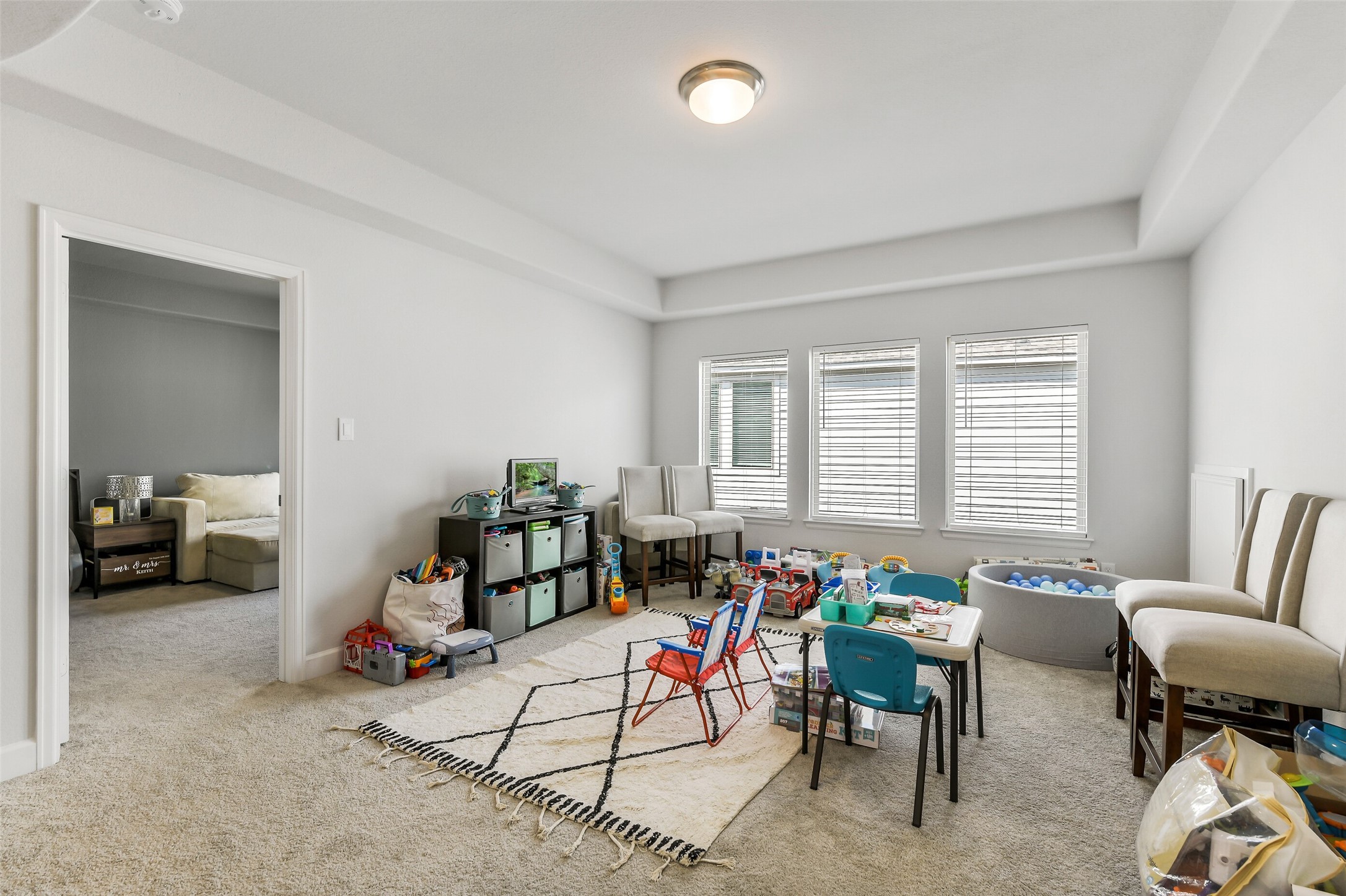 21222 Rabbitbrush Court Cypress, TX 77433 - Photo 24 of 36 a living room with furniture and a table