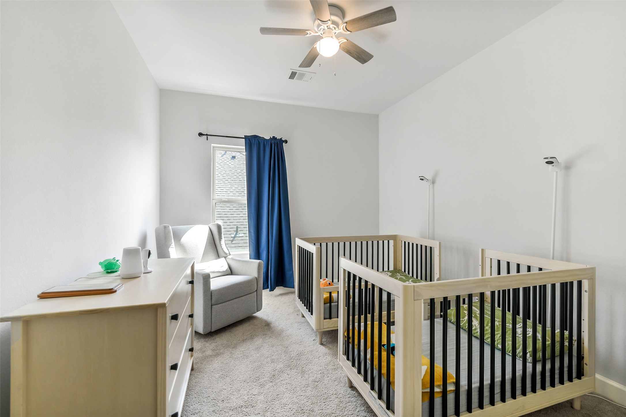 21222 Rabbitbrush Court Cypress, TX 77433 - Photo 30 of 36 a bedroom with furniture and a window