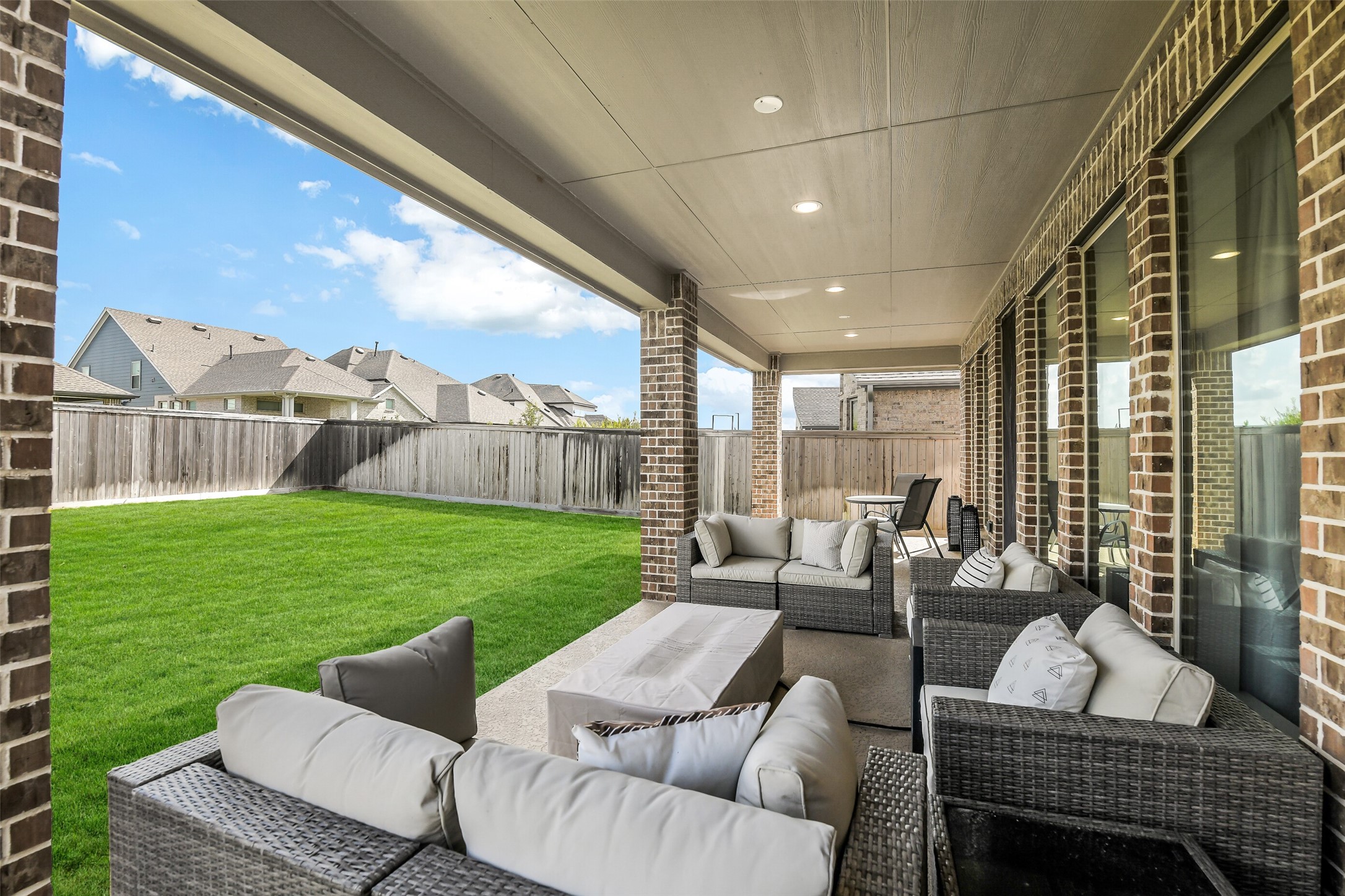21222 Rabbitbrush Court Cypress, TX 77433 - Photo 34 of 36 a outdoor living space with furniture and garden view