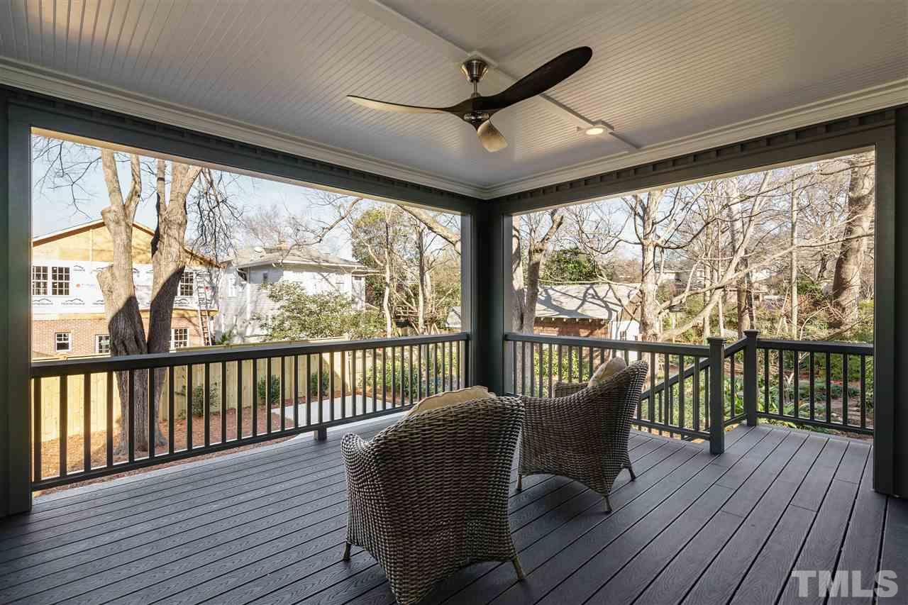306 Duncan Street Raleigh, NC 27608 - Photo 22 of 25 a view of a porch with furniture and wooden floor