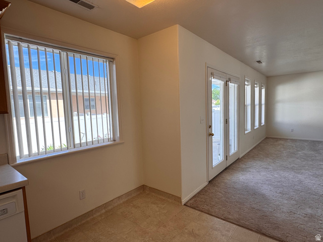 461 Topaz Boulevard, Unit 6 Delta, UT 84624 - Photo 8 of 45 dining and living room. Access to back yard.