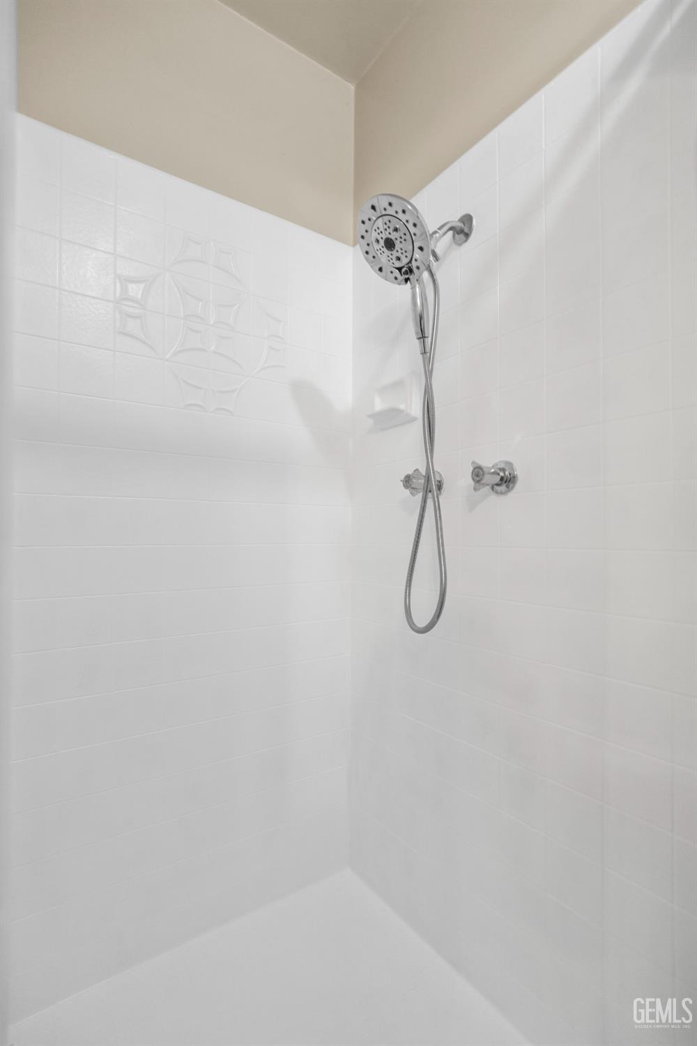 Undisclosed Address Bakersfield, CA 93313 - Photo 18 of 24 a bathroom with a bath tub