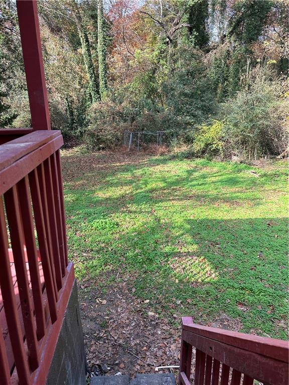 2647 Baker Ridge Drive Northwest Atlanta, GA 30318 - Photo 30 of 39 a view of a backyard with sitting area