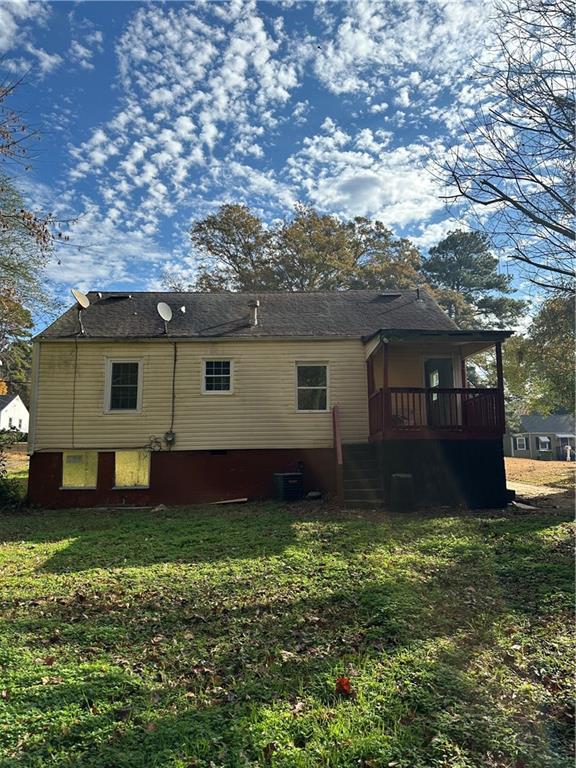 2647 Baker Ridge Drive Northwest Atlanta, GA 30318 - Photo 39 of 39 a view of a house with a yard