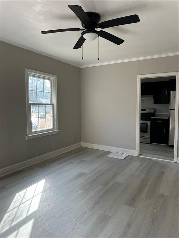 2647 Baker Ridge Drive Northwest Atlanta, GA 30318 - Photo 5 of 39 a view of an empty room with a window