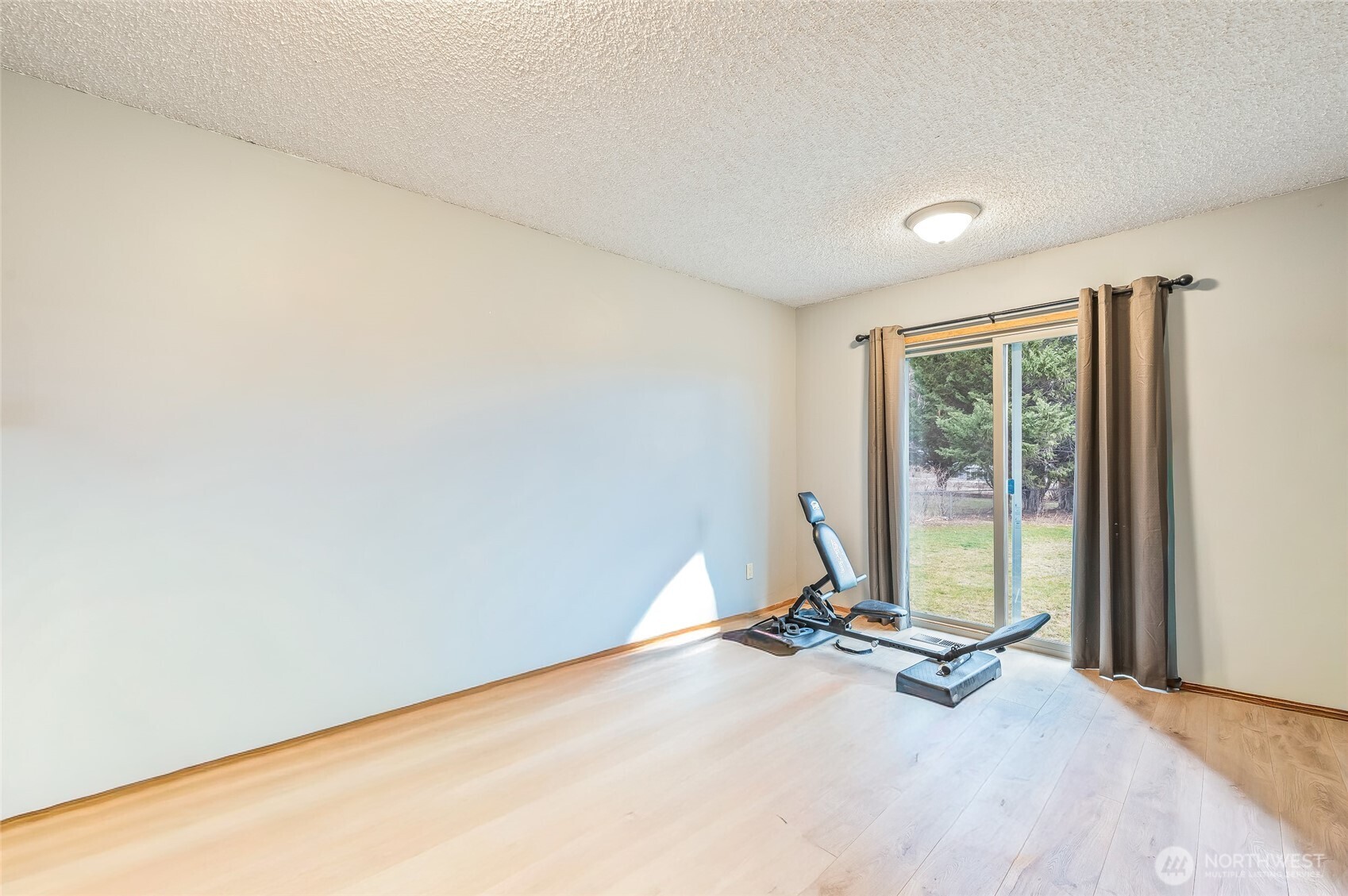 1919 B Fifth Street Wenatchee, WA 98801 - Photo 35 of 40 an empty room with large windows