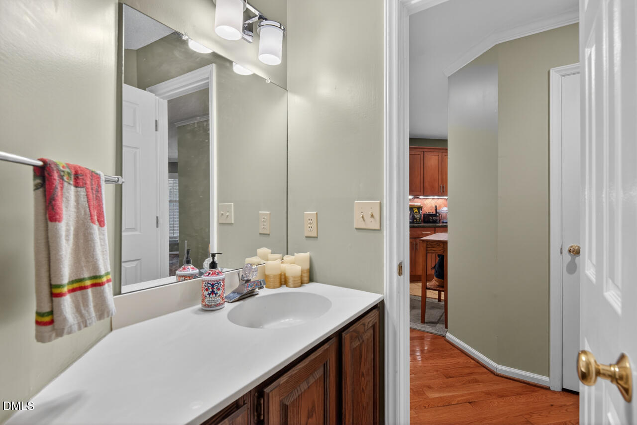 3307 Coachman's Way Durham, NC 27705 - Photo 27 of 50 a bathroom with a tub sink and mirror