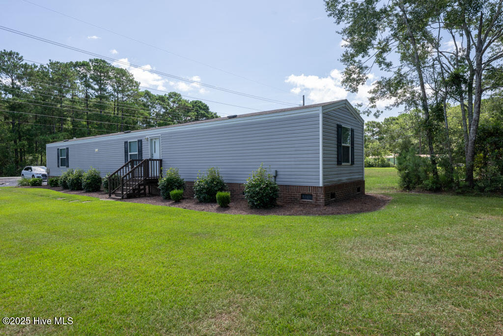 1193 Clariday Road Southwest Calabash, NC 28467 - Photo 4 of 17 rear-right