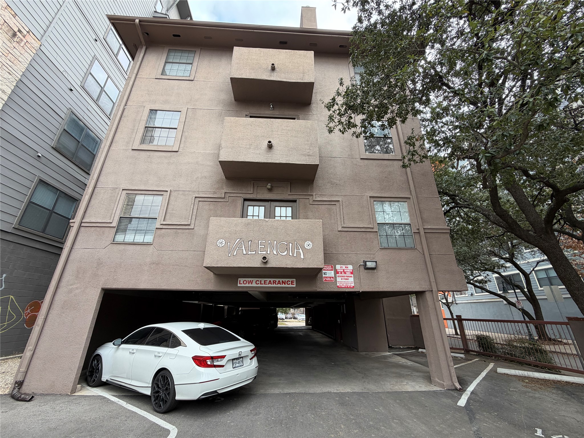 2509 Pearl Street, Unit 7 Austin, TX 78705 - Photo 20 of 23 a car parked in front of a building