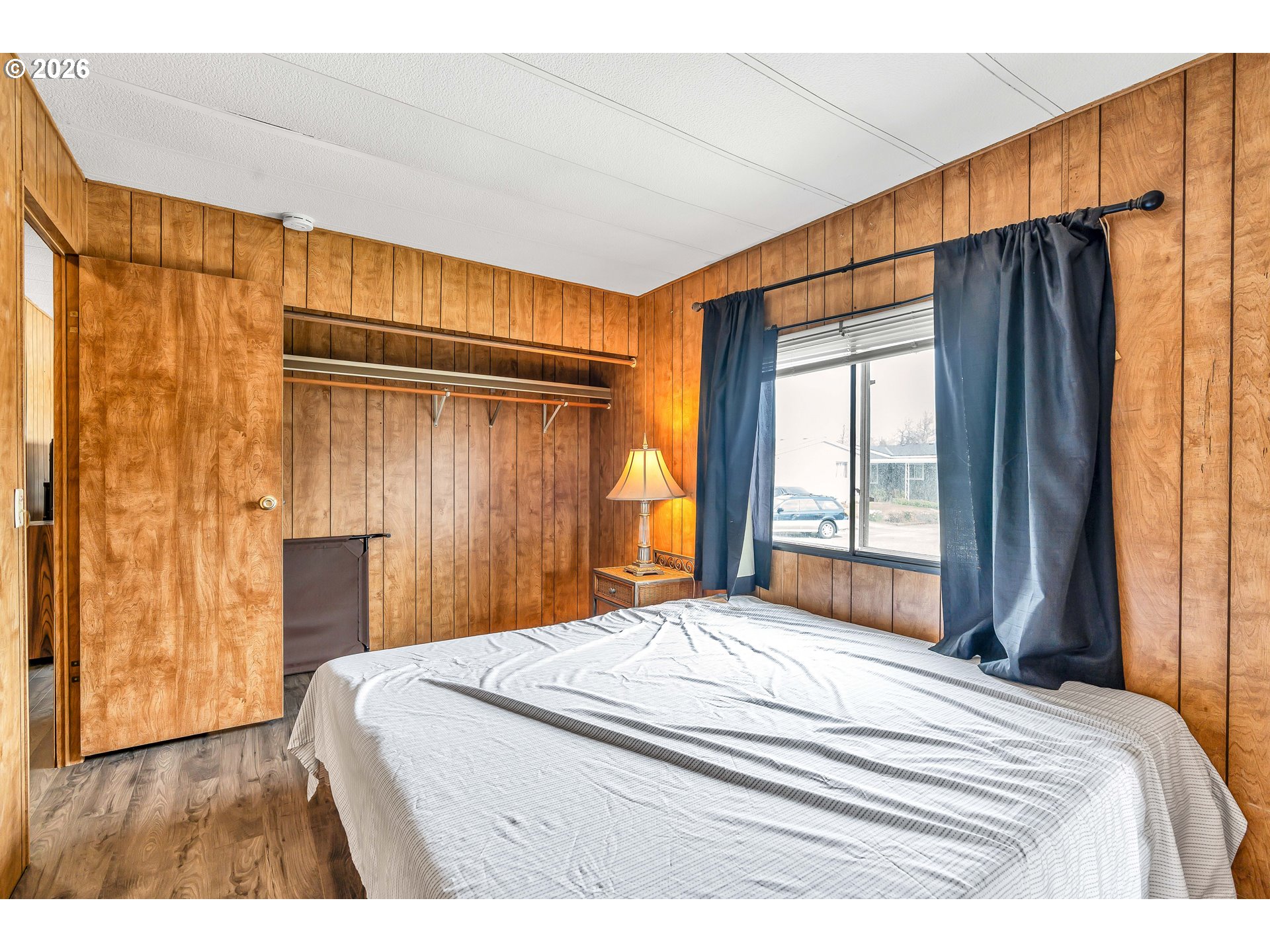 4783 Joyce Street, Unit 93 Keizer, OR 97303 - Photo 18 of 33 a bedroom with a bed and a dresser
