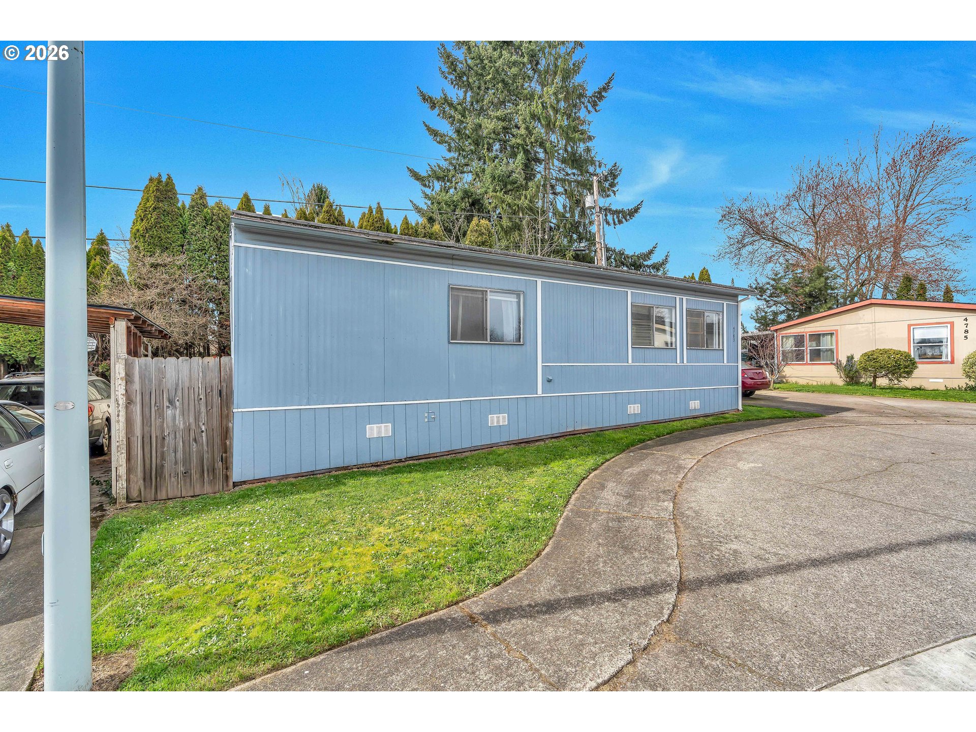 4783 Joyce Street, Unit 93 Keizer, OR 97303 - Photo 3 of 33 a view of back yard of the house