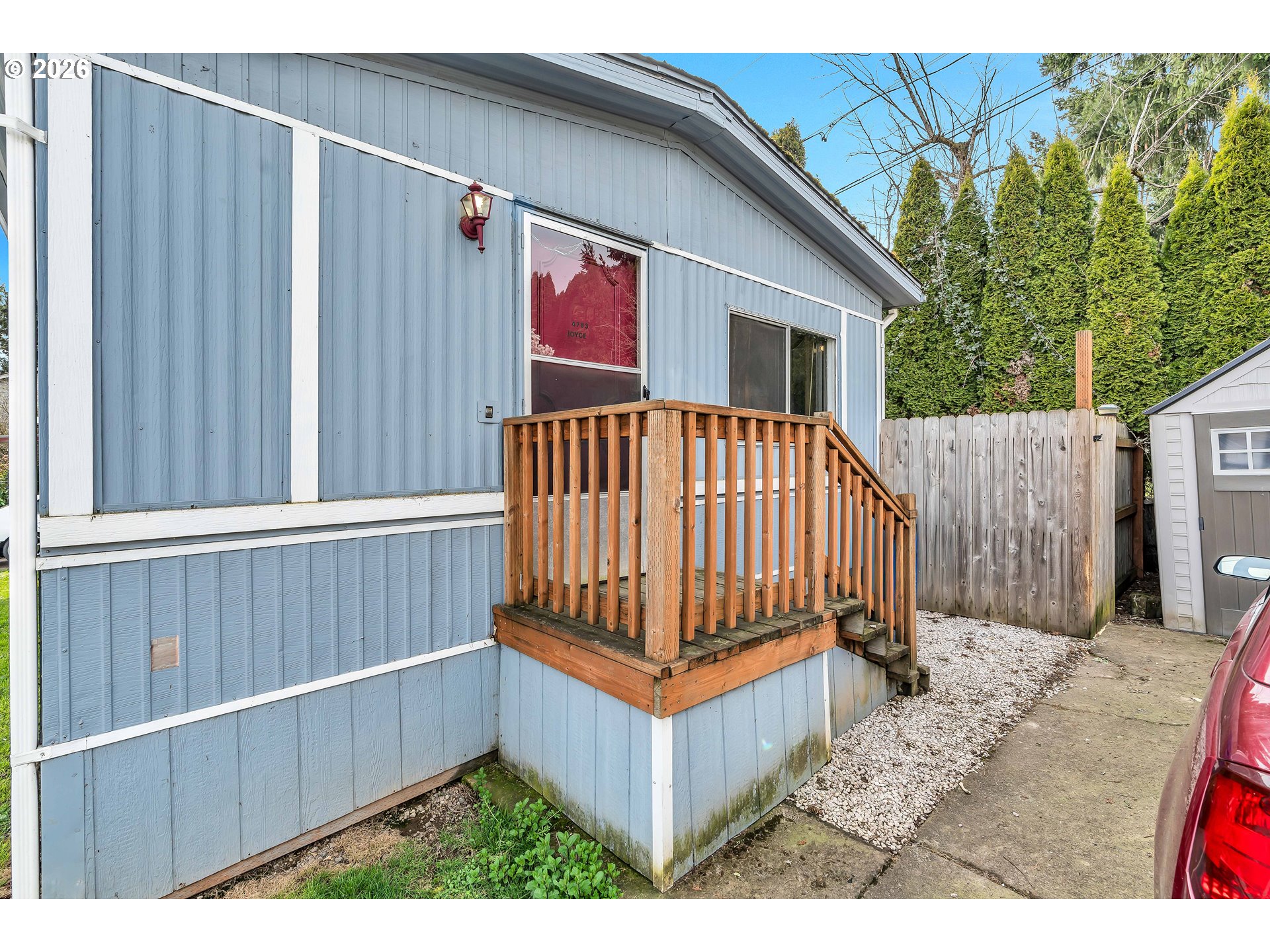 4783 Joyce Street, Unit 93 Keizer, OR 97303 - Photo 4 of 33 a view of a porch with a bench
