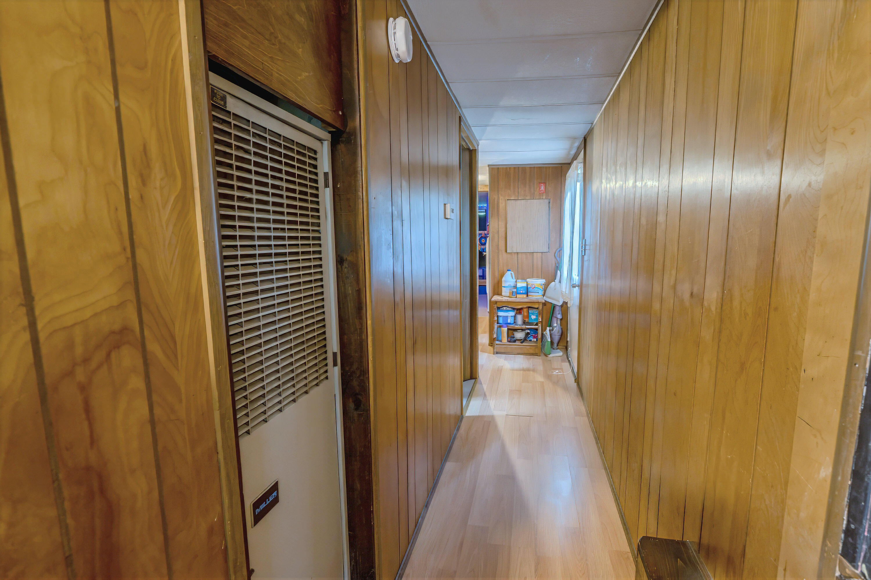 663 Bangor Road Troy, ME 04987 - Photo 13 of 27 Hallway to Laundry, Bath, and Bedrooms