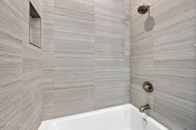 a bathroom with a bathtub