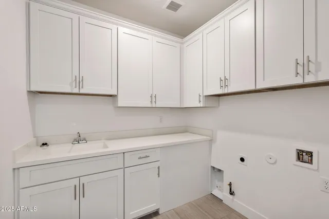 a view of a balcony with a potted plant