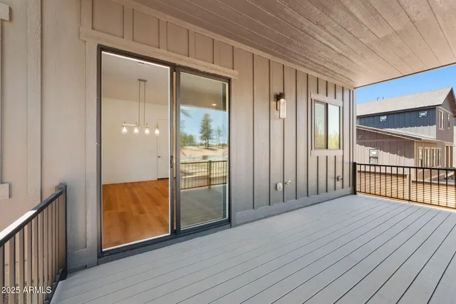 a view of a house with a snow in the yard