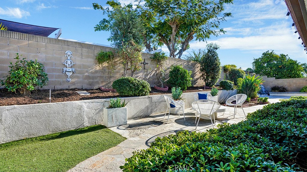 25312 Pizarro Road Lake Forest, CA 92630 - Photo 27 of 36 a view of a chair and table in the garden