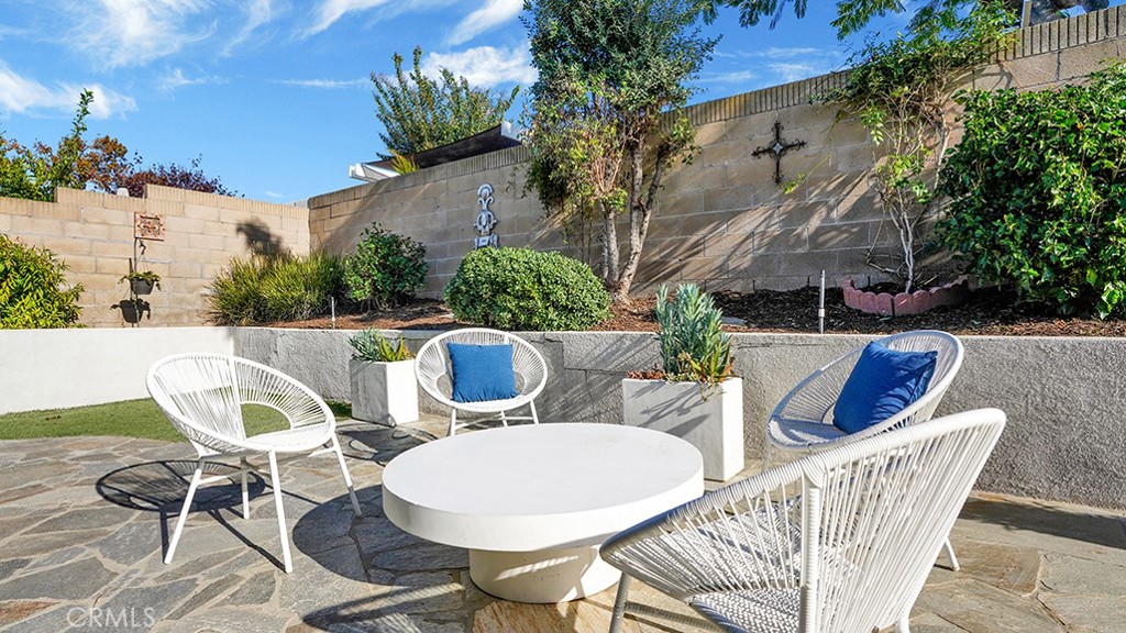 25312 Pizarro Road Lake Forest, CA 92630 - Photo 28 of 36 a view of a chairs and table in the patio