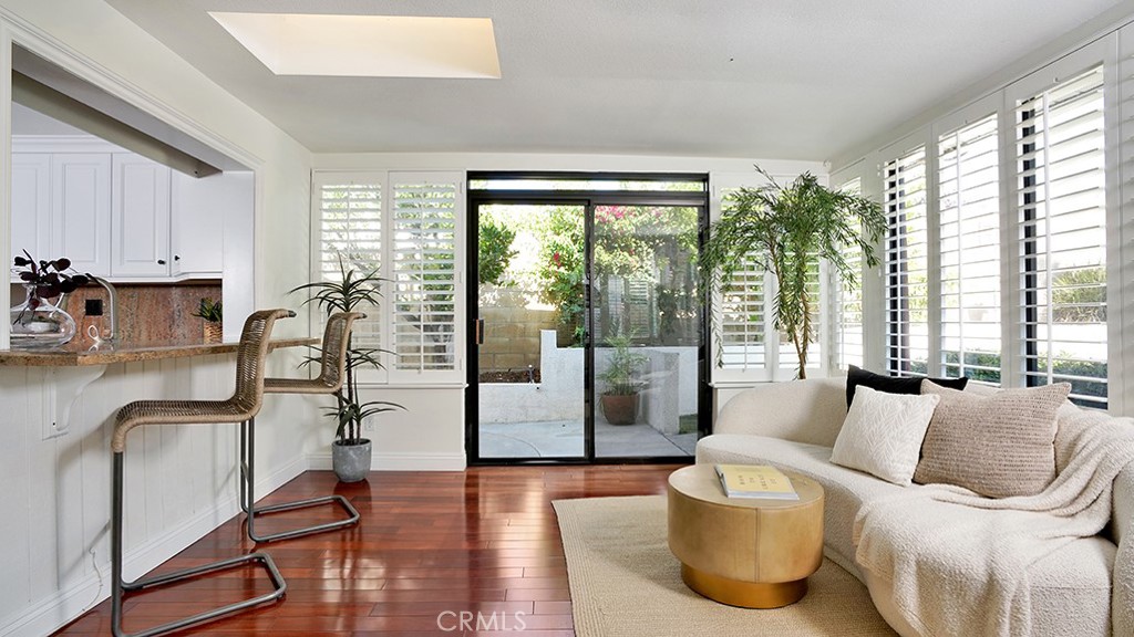 25312 Pizarro Road Lake Forest, CA 92630 - Photo 7 of 36 a living room with furniture and a large window