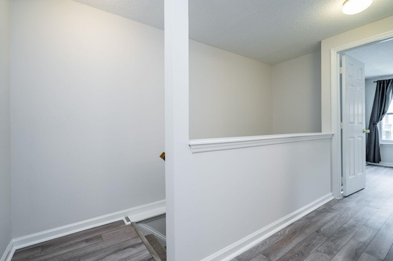 4331 Halliwell Drive Raleigh, NC 27606 - Photo 12 of 24 Upstairs Hallway