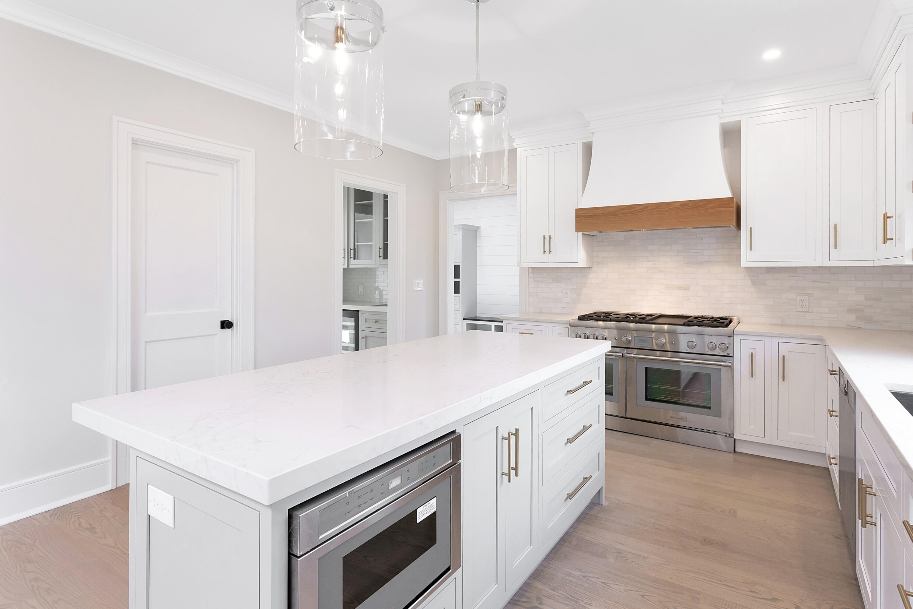 159 Middlesex Road Darien, CT 06820 - Photo 12 of 38 a kitchen with a stove and a refrigerator