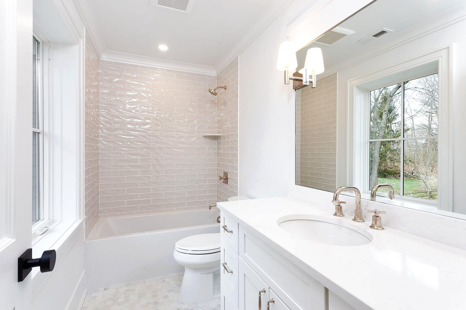 159 Middlesex Road Darien, CT 06820 - Photo 24 of 38 a bathroom with a sink toilet tub and shower