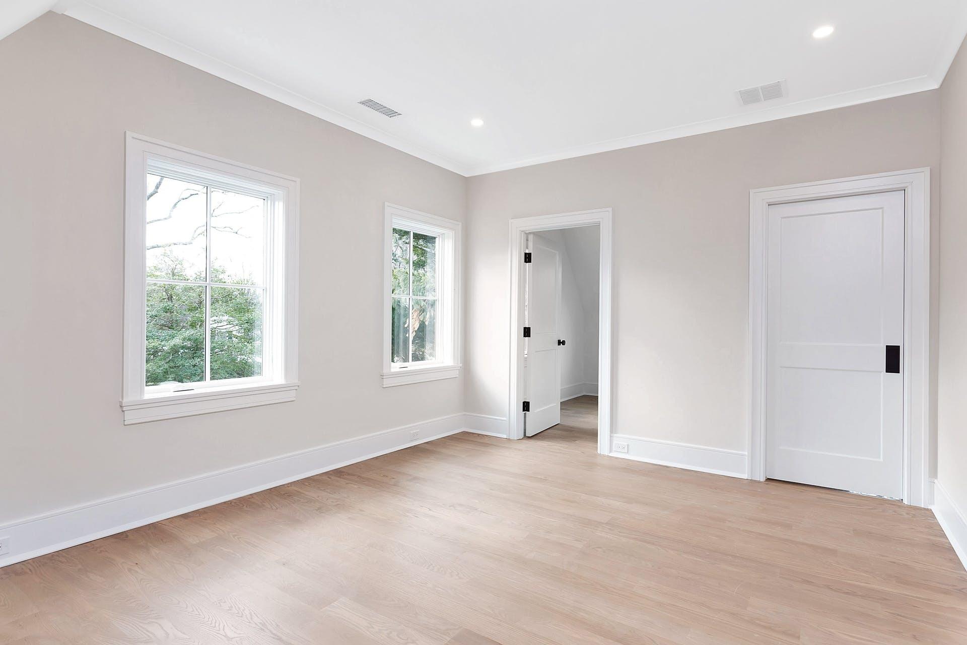 159 Middlesex Road Darien, CT 06820 - Photo 26 of 38 an empty room with windows and closet