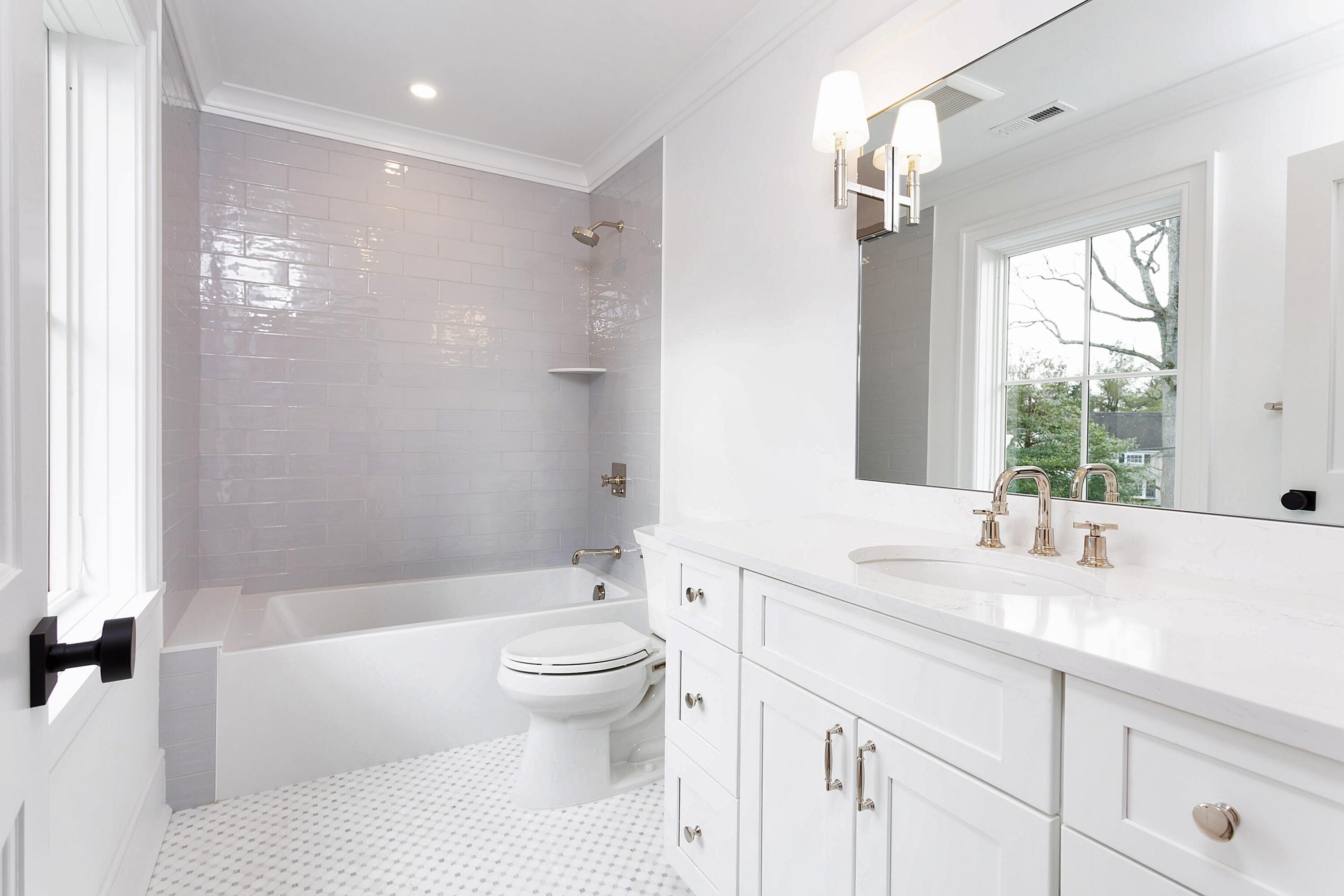 159 Middlesex Road Darien, CT 06820 - Photo 27 of 38 a bathroom with a sink a toilet and a bathtub