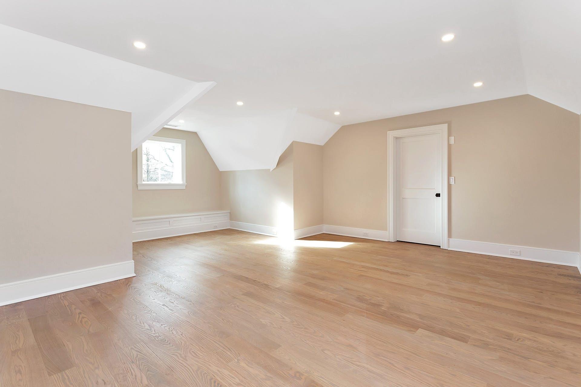 159 Middlesex Road Darien, CT 06820 - Photo 30 of 38 an empty room with wooden floor and windows