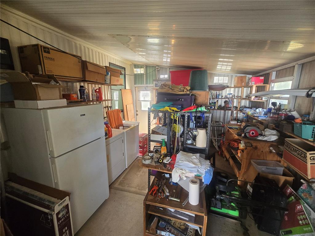 1710 7th Street Southwest, Unit 59 Ruskin, FL 33570 - Photo 18 of 31 a view of a storage with a refrigerator