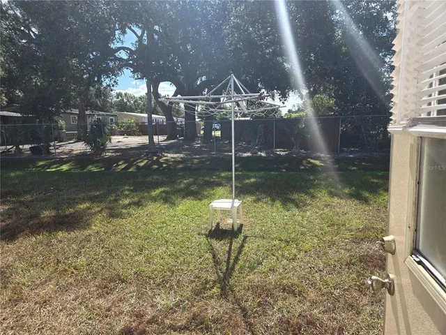 a view of outdoor space and yard