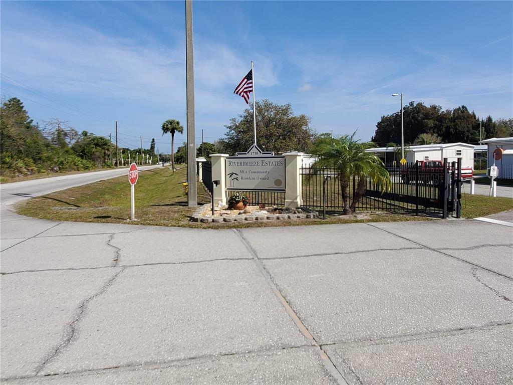 1710 7th Street Southwest, Unit 59 Ruskin, FL 33570 - Photo 23 of 31 a view of a street with houses