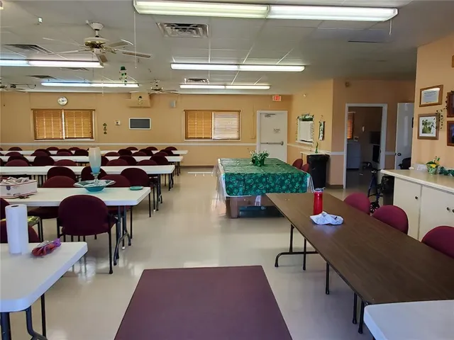 a view of swimming pool and outdoor seating