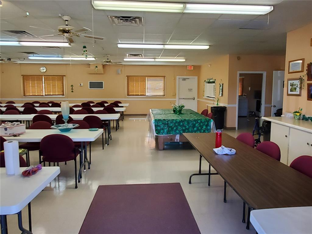 1710 7th Street Southwest, Unit 59 Ruskin, FL 33570 - Photo 25 of 31 a room with furniture pool view and a rug