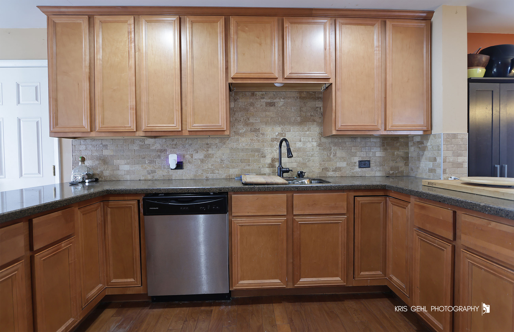 33312 North Lone Rock Road Grayslake, IL 60030 - Photo 7 of 25 a kitchen with granite countertop stainless steel appliances a refrigerator and cabinets