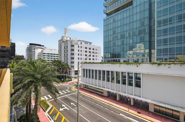 a view of balcony with a potted plant