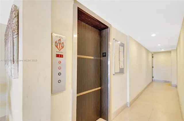 a view of a hallway with staircase