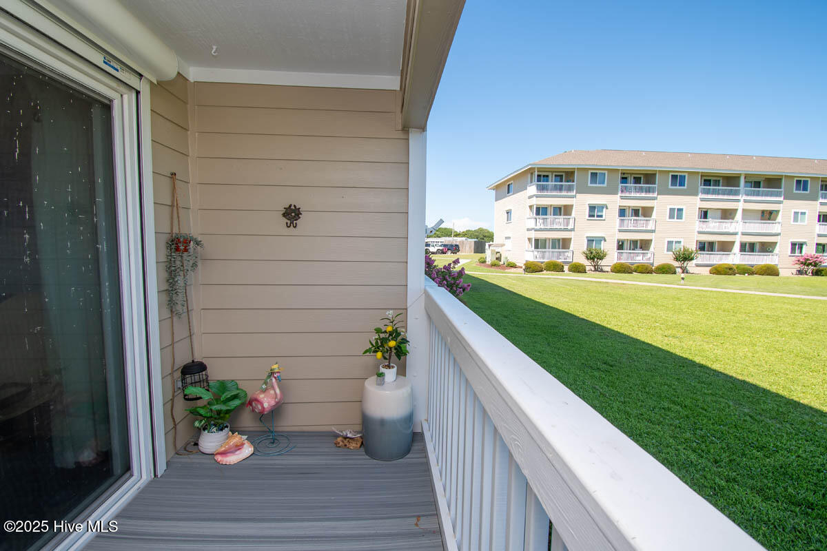 650 Cedar Point Boulevard, Unit A15 Cedar Point, NC 28584 - Photo 22 of 34 Deck-Trex flooring!