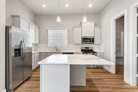 a view of a room with rack on the wall